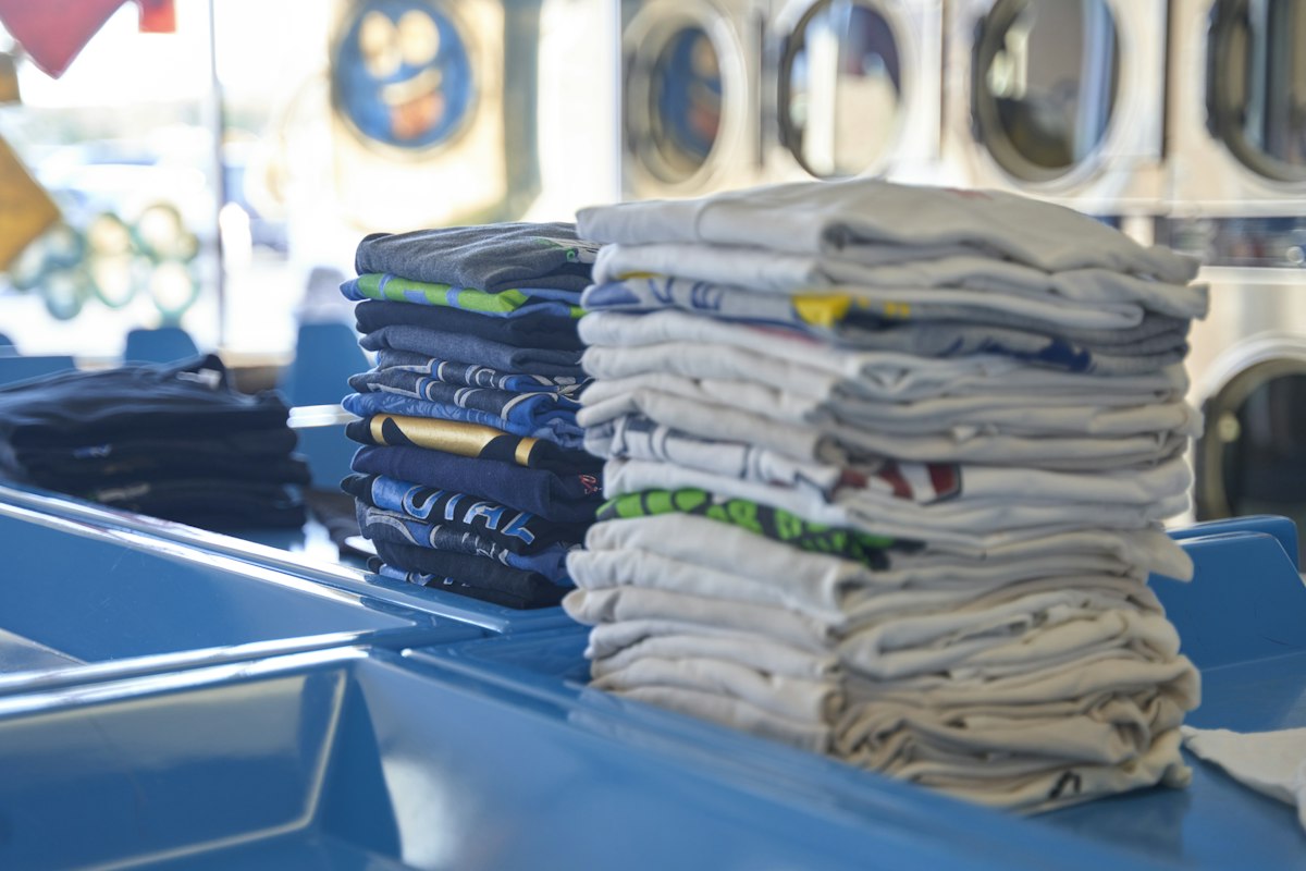 Neat stacks of freshly folded laundry